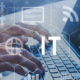 The term "IT" illustrating the integration of technology services in business practices and support.